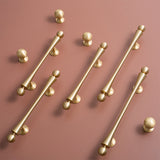 Modern Scroll-Inspired Brass Cabinet Pulls