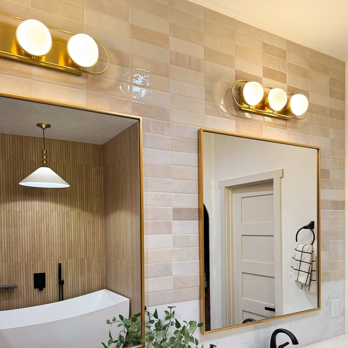 Lyra Aged Brass Globe Vanity Sconce - Warm Ambient Bathroom Light