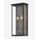 Chauncey Sconce vintage-inspired aged nickel wall light with opal glass shade and warm ambient glow in elegant hallway
