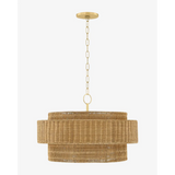 Danica Wicker Pendant handwoven hanging light with warm filtered glow over dining table in bohemian interior