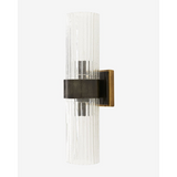 Hazel Sconce warm-toned brushed finish wall light with soft upward ambient glow in cosy bedroom interior