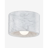 Loris Flush Mount geometric sculptural ceiling light with warm diffused glow in modern bedroom interior
