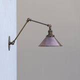 Adjustable Swing-Arm Wall Sconce with Aged Copper Cone Shade