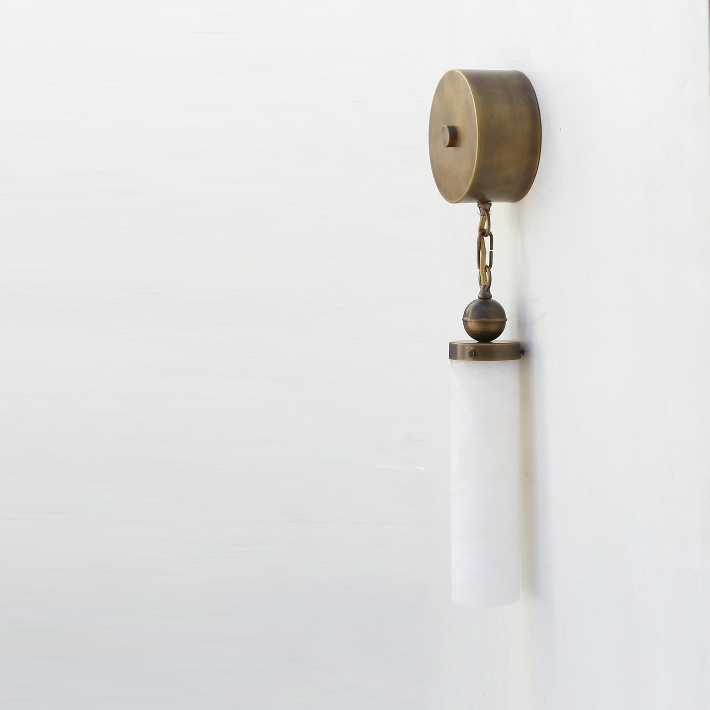 Alabaster Column Wall Sconce with Brass Disc Backplate