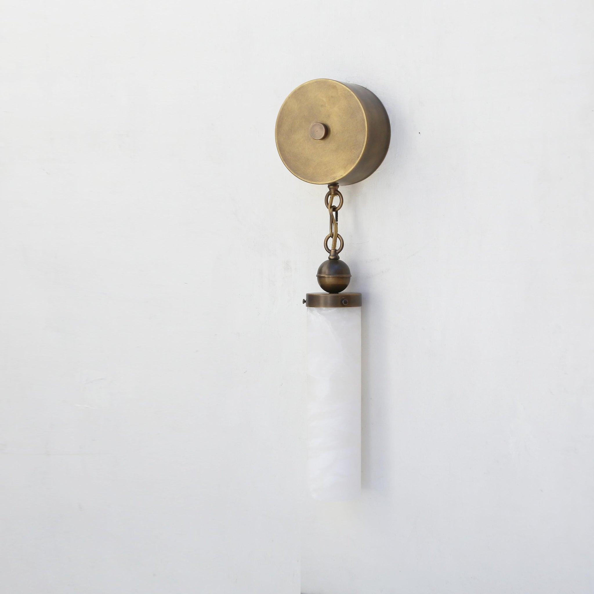 Alabaster Column Wall Sconce with Brass Disc Backplate