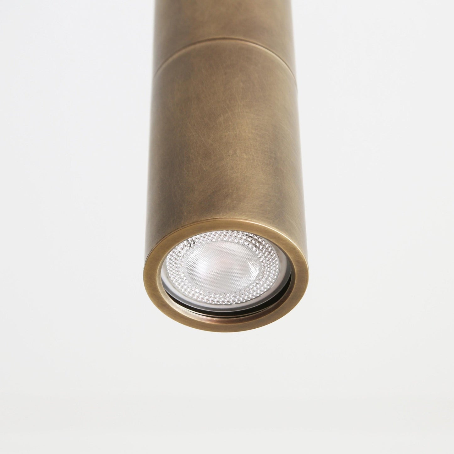 Brass Cylinder Ceiling Spotlight on Drop-Down Arm