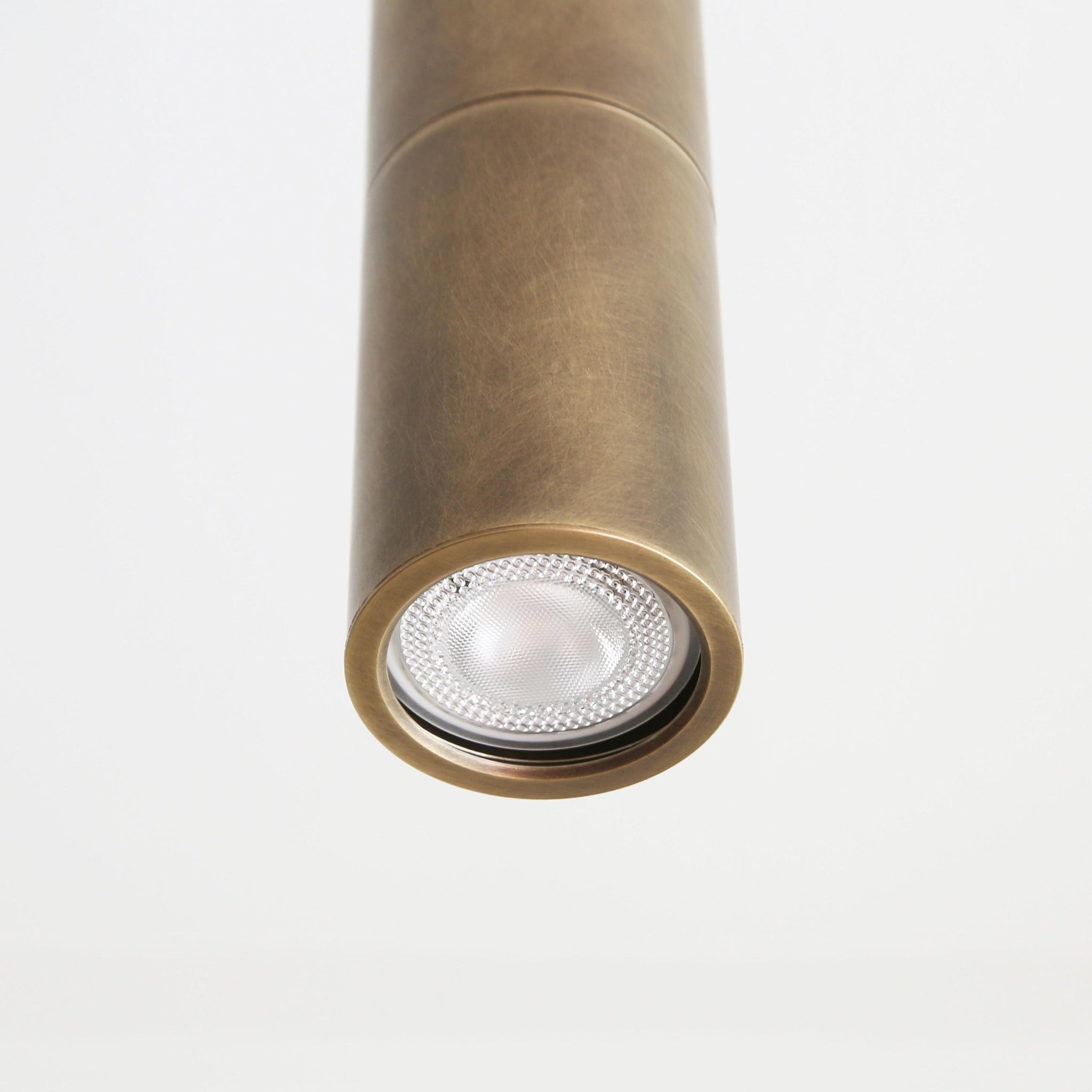Brass Cylinder Ceiling Spotlight on Drop-Down Arm