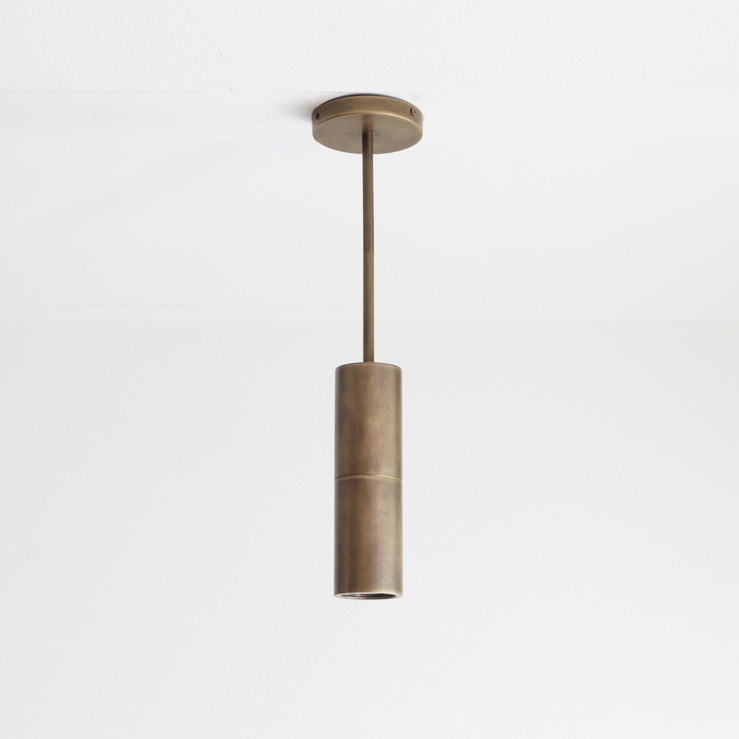 Brass Cylinder Ceiling Spotlight on Drop-Down Arm