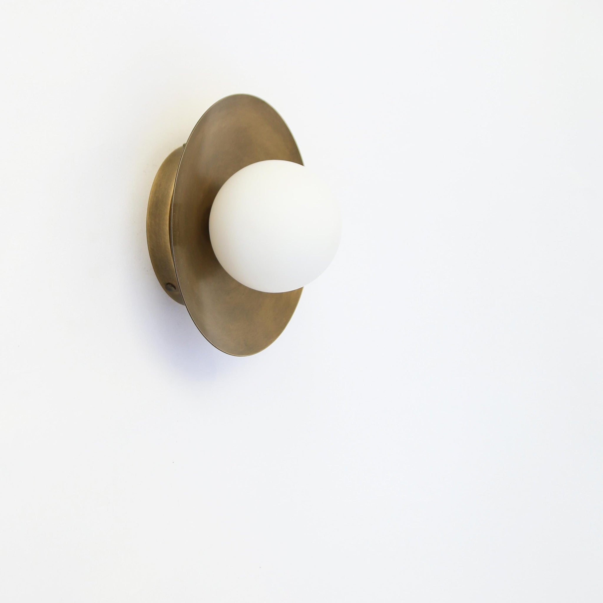 One-Light Brass Disc Wall Sconce with Opal Globe