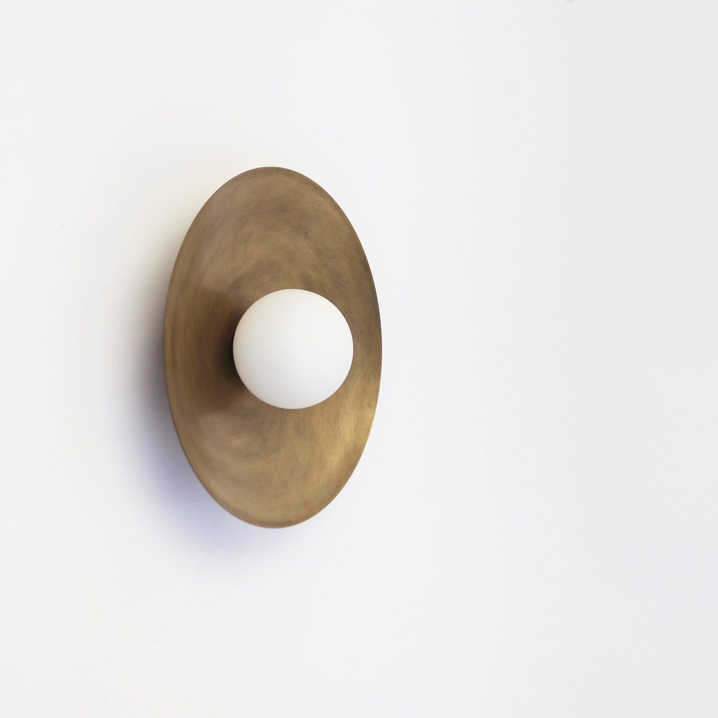 One-Light Brass Disc Wall Sconce with Opal Globe