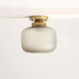 Contemporary Brass Flush Mount Ceiling Light with Textured Glass Shade