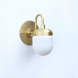 Brass Gooseneck Wall Sconce with Opal Capsule Shade