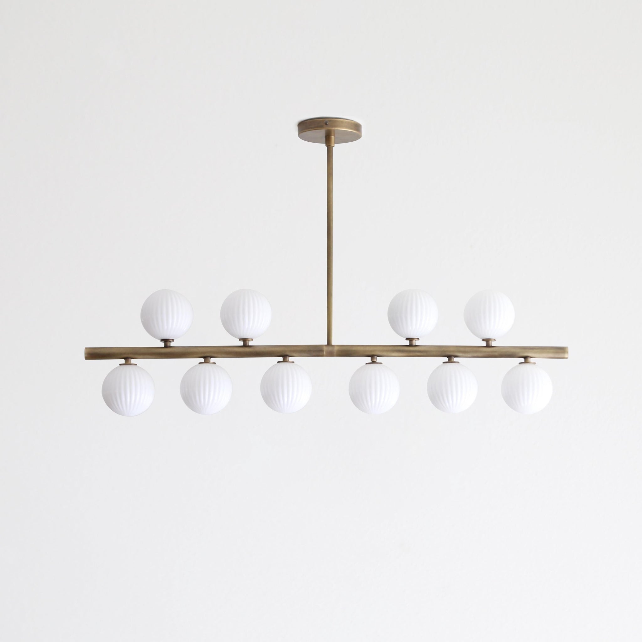 Brass Linear Chandelier with Ribbed Opal Globes
