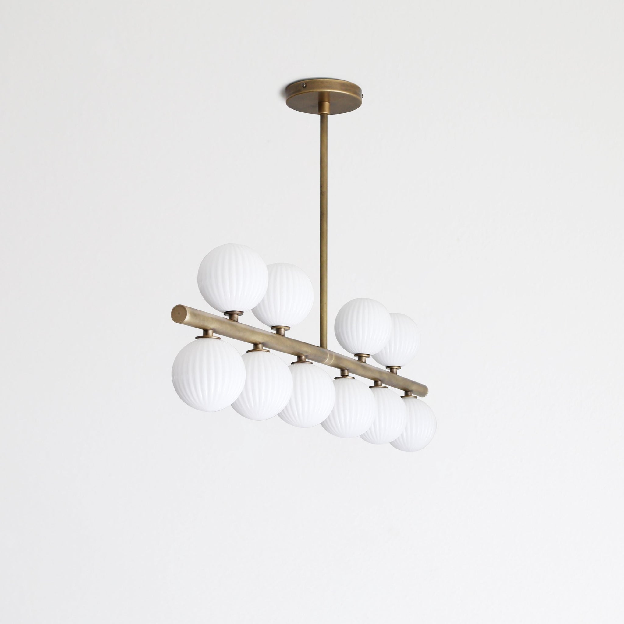 Brass Linear Chandelier with Ribbed Opal Globes