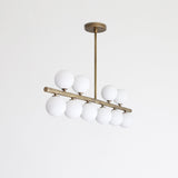Brass Linear Chandelier with Ribbed Opal Globes