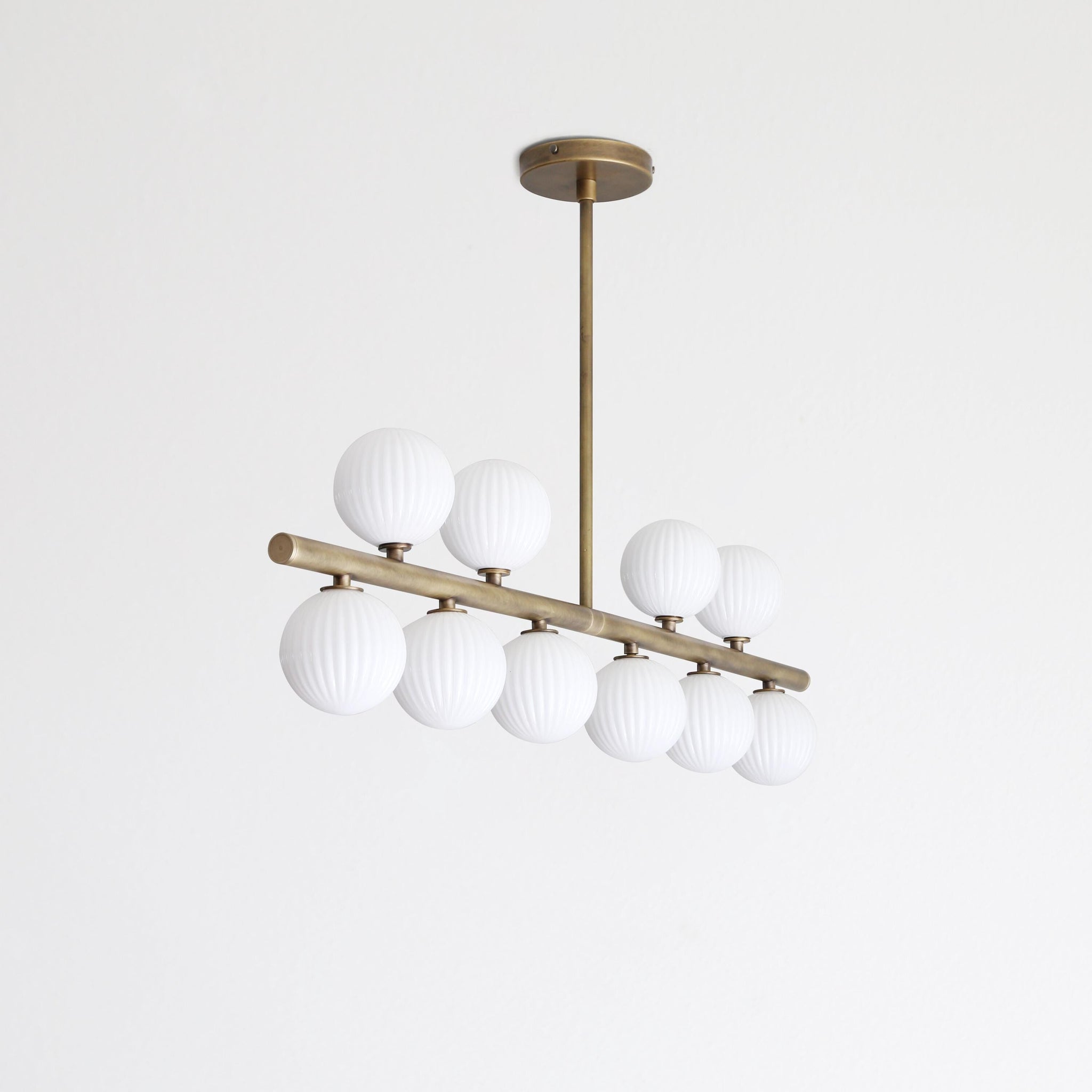 Brass Linear Chandelier with Ribbed Opal Globes
