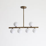 Brass Linear Chandelier with Ribbed Opal Globes