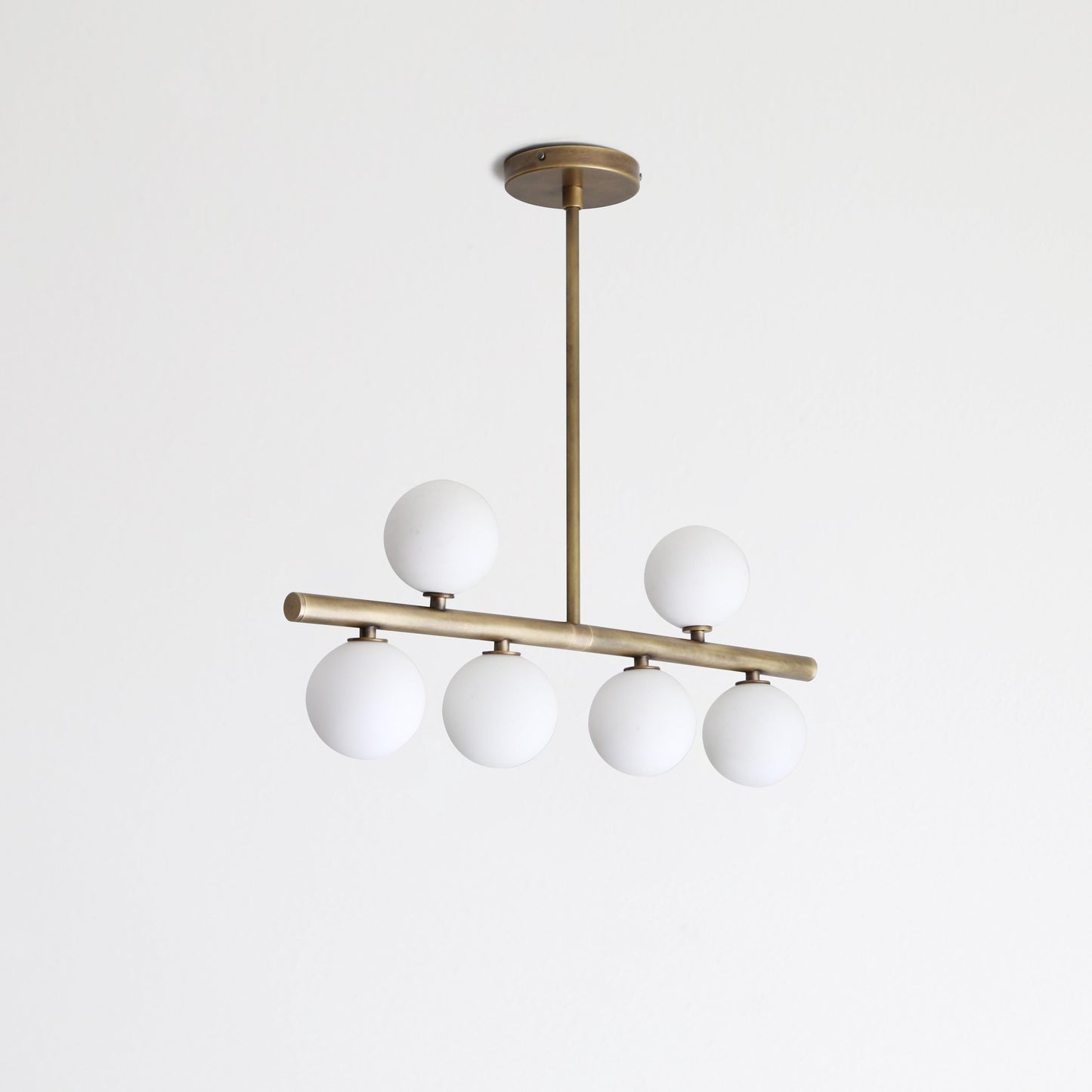 Brass Linear Chandelier with Ribbed Opal Globes