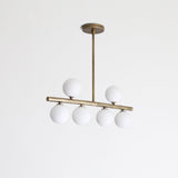 Brass Linear Chandelier with Ribbed Opal Globes
