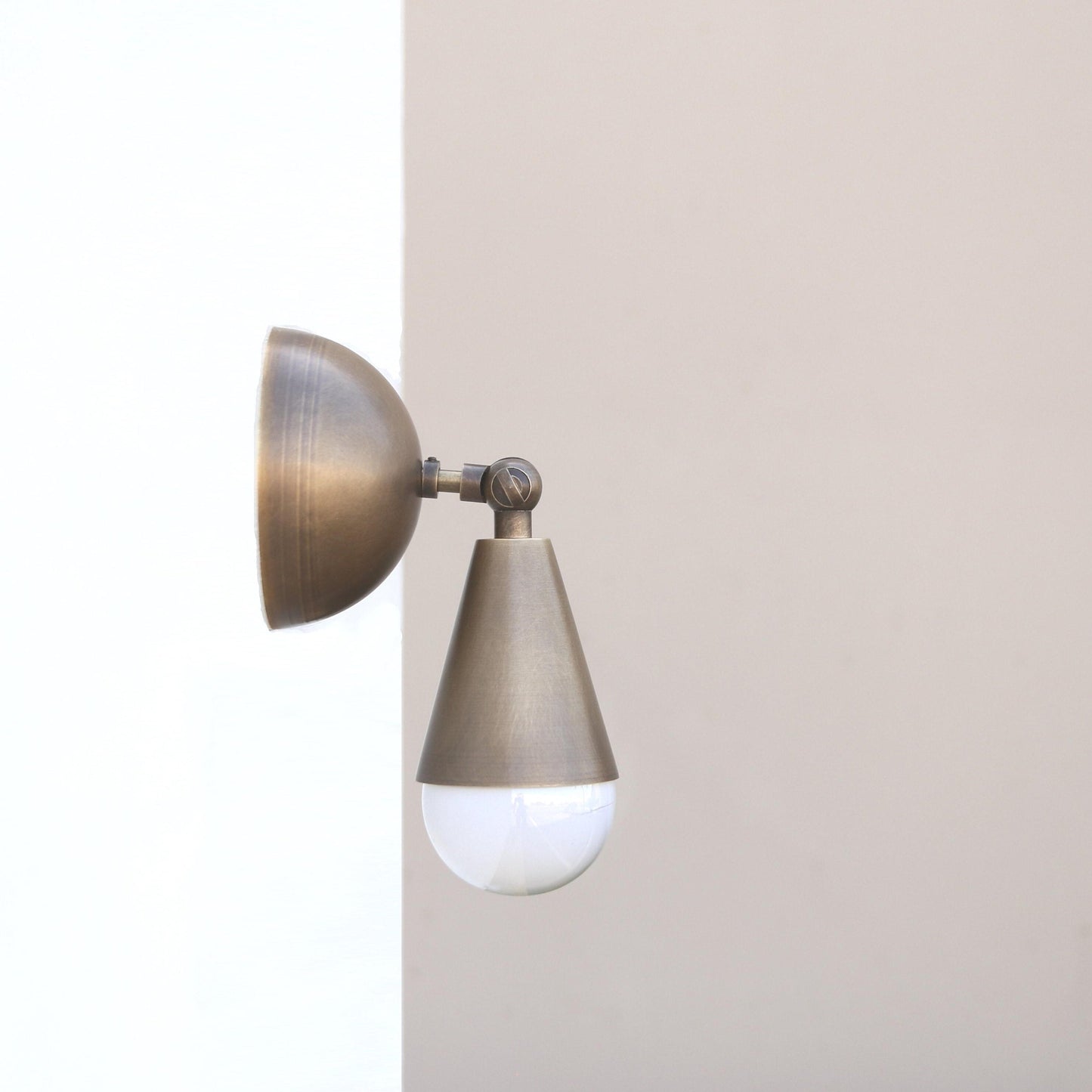 Brass Wall Sconce with Curved Arm and Tapered Shade