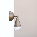 Brass Wall Sconce with Curved Arm and Tapered Shade