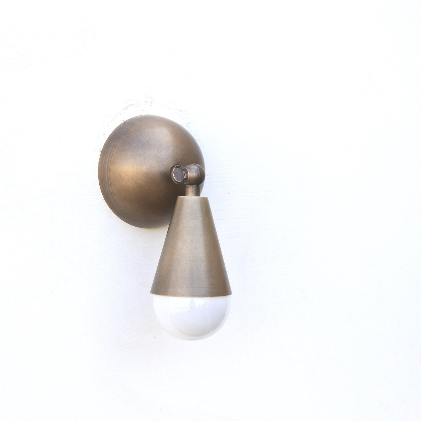 Brass Wall Sconce with Curved Arm and Tapered Shade