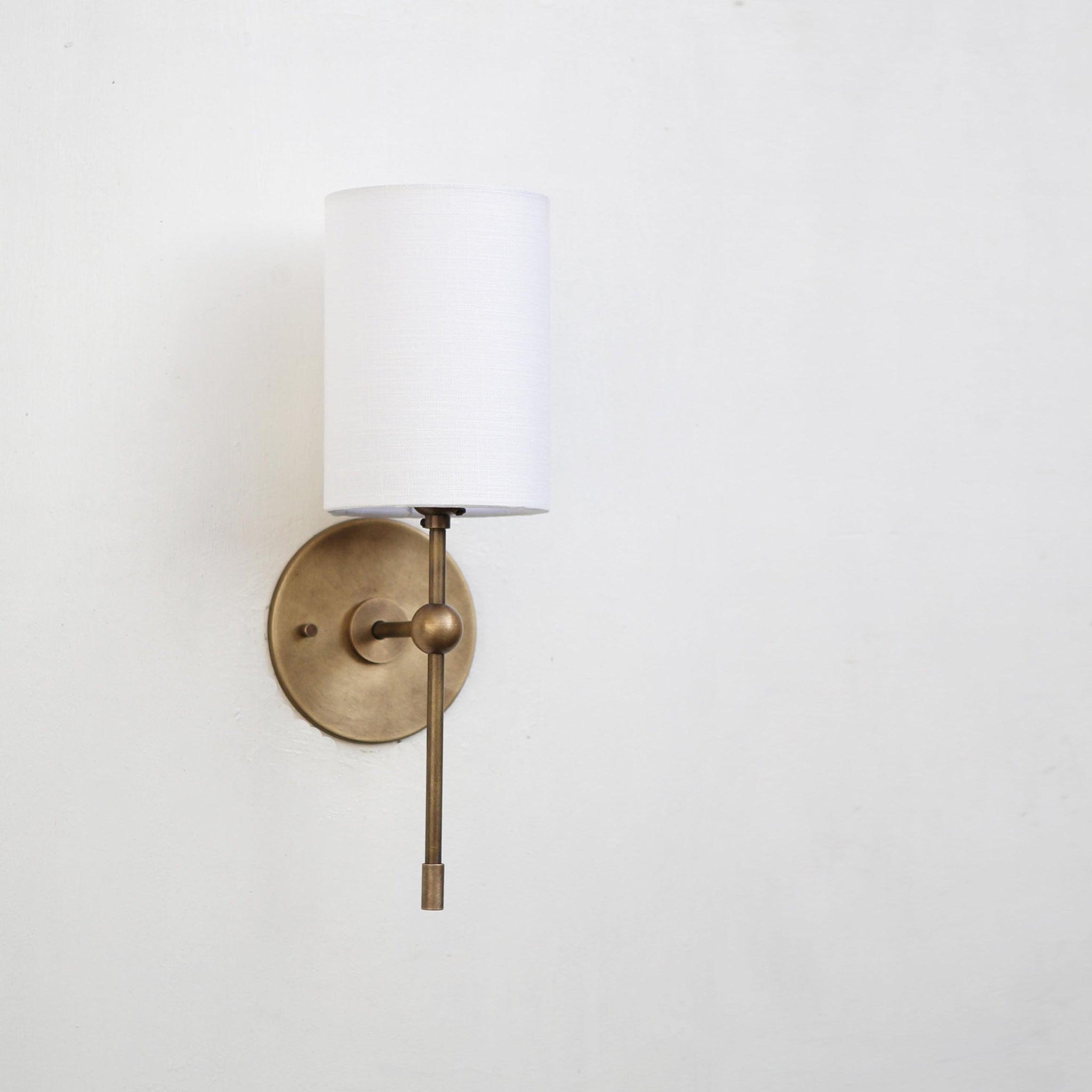 Brass Wall Sconce with Linen Cylinder Shade and Drop Stem