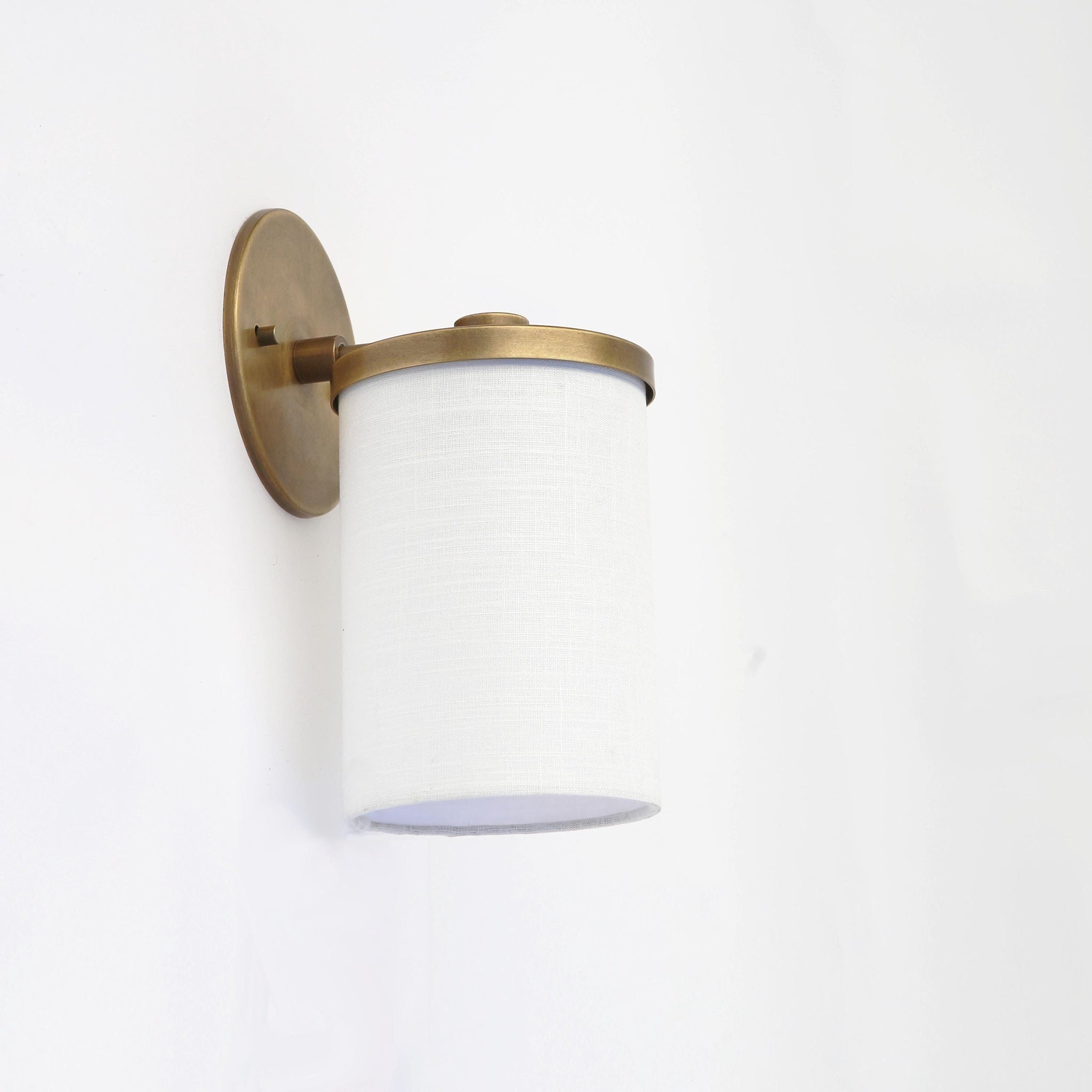 Brass Wall Sconce with Off-White Linen Drum Shade