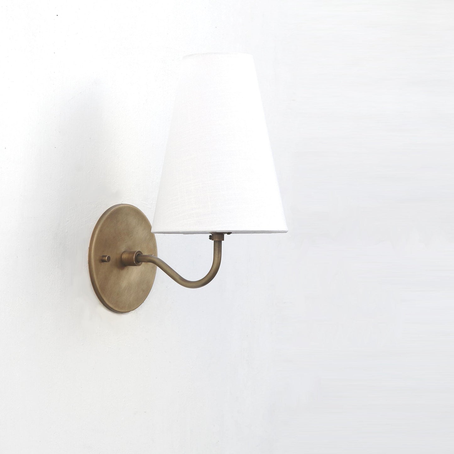 Brass Wall Sconce with Tall Tapered Linen Shade