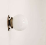 brass base wall sconce light