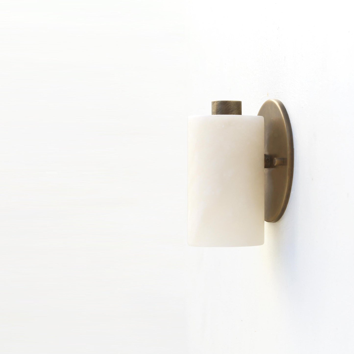 Compact Alabaster Cylinder Wall Sconce
