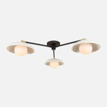 Delphine Glass Globe Triple Flush Mount three clear glass globe ceiling light with warm even glow in elegant bedroom interior