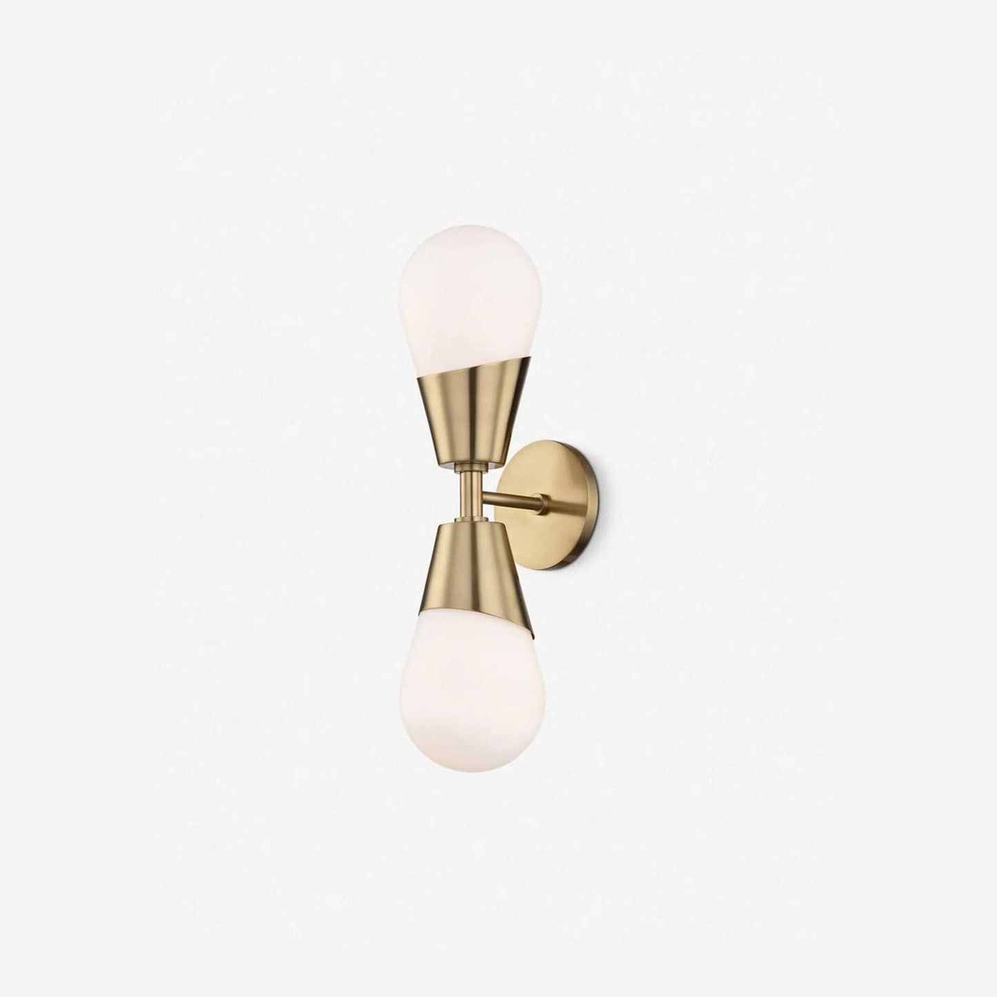 Prim Aged Brass Opal Glass 2-Light Wall Sconce heritage dual-globe patinated brass wall light with warm milky glow in elegant bedroom interior