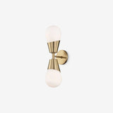 Prim Aged Brass Opal Glass 2-Light Wall Sconce heritage dual-globe patinated brass wall light with warm milky glow in elegant bedroom interior