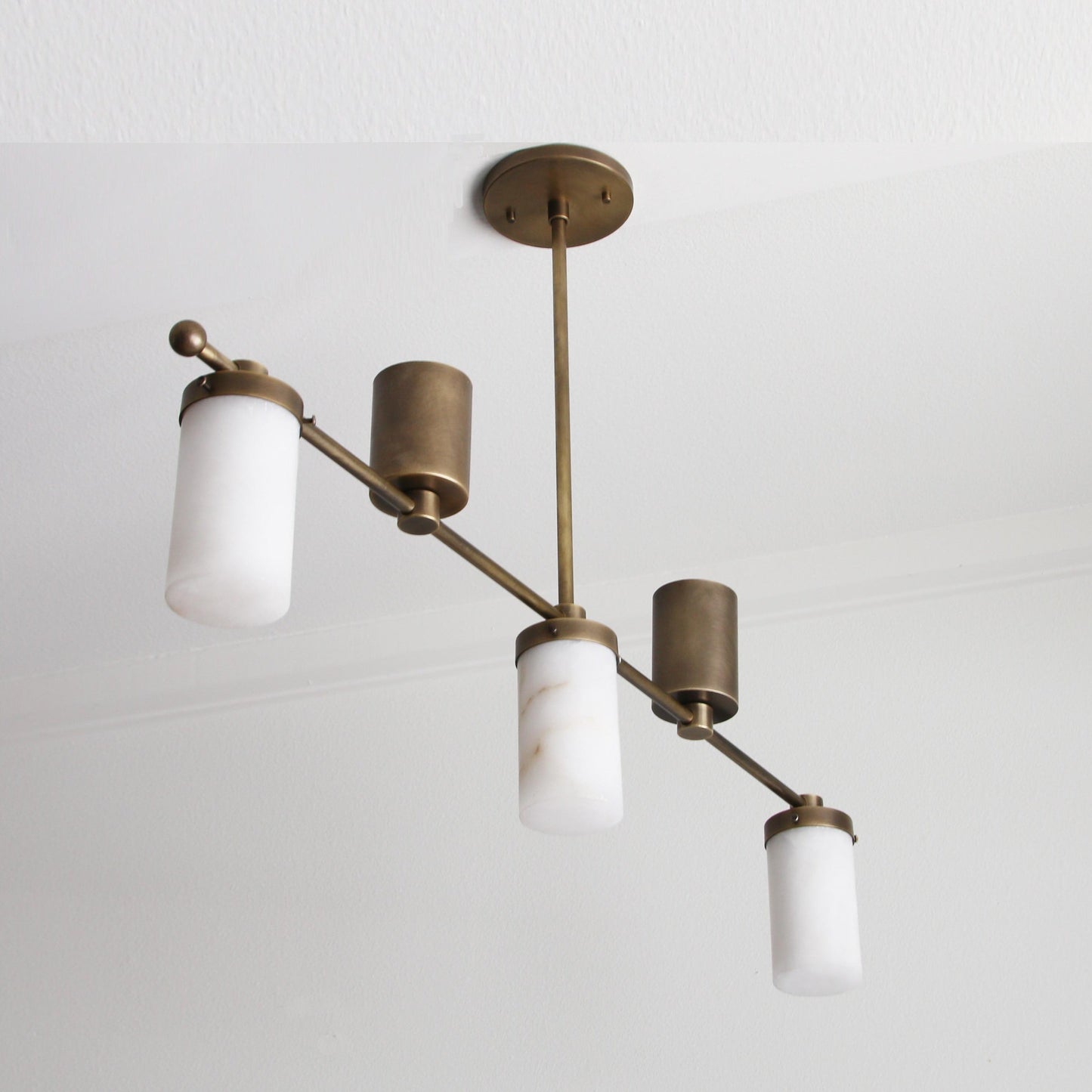 Five-Light Linear Brass Chandelier with Cylinder Shades