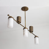 Five-Light Linear Brass Chandelier with Cylinder Shades