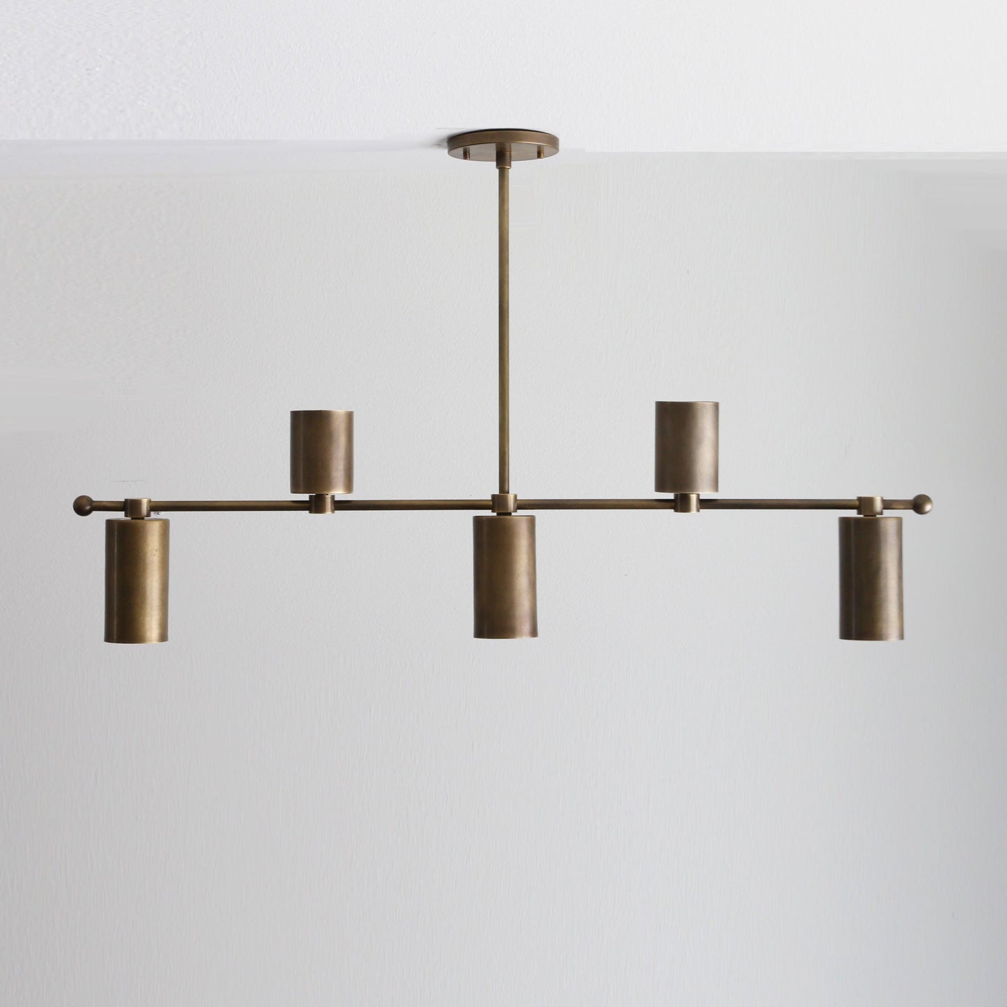 Five-Light Linear Brass Chandelier with Cylinder Shades