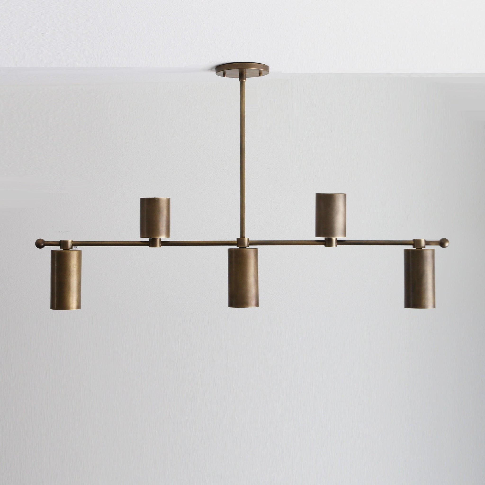Five-Light Linear Brass Chandelier with Cylinder Shades