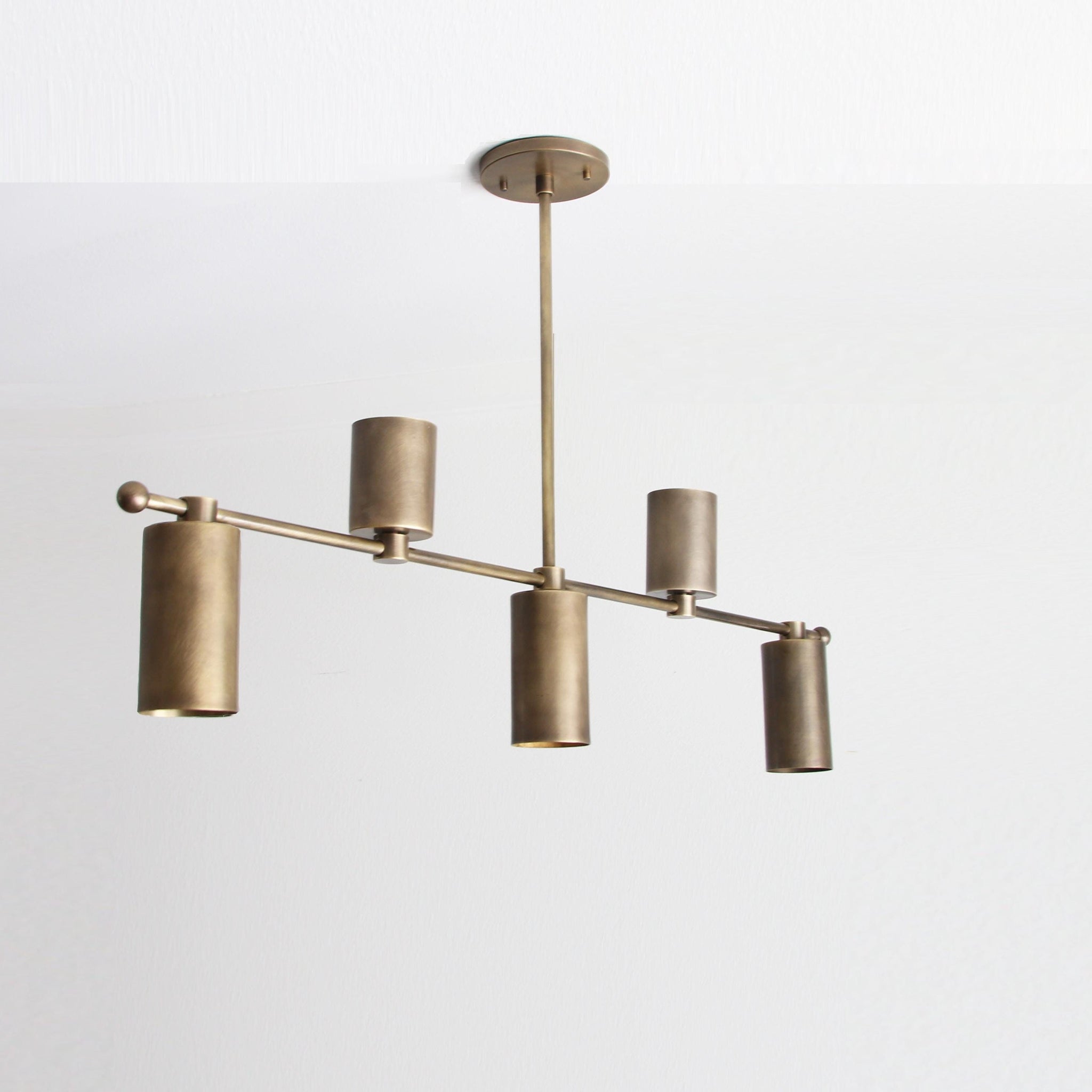 Five-Light Linear Brass Chandelier with Cylinder Shades