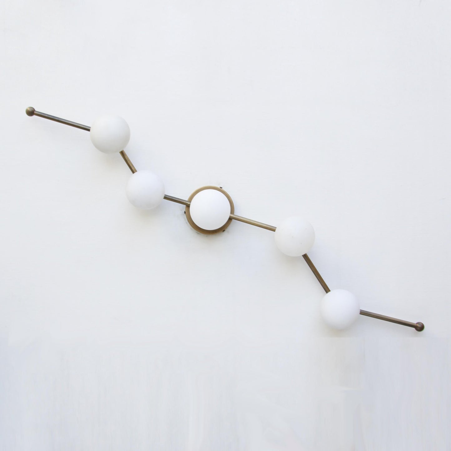 Five-Light Staggered Brass Bar Sconce with Opal Glass Globes