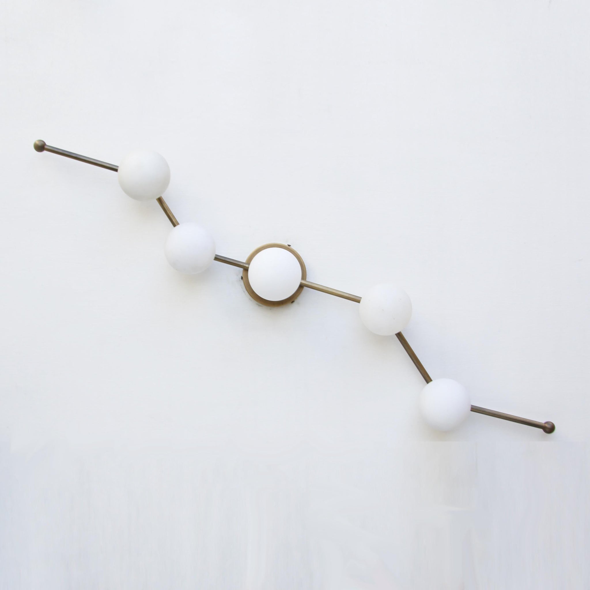 Five-Light Staggered Brass Bar Sconce with Opal Glass Globes