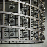 la cage 8 light chandelier in bronze