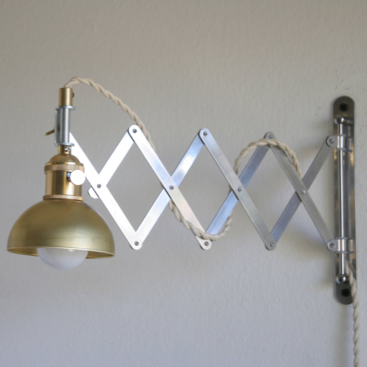 One-Light Accordion Scissor Wall Lamp with Brass Dome Shade