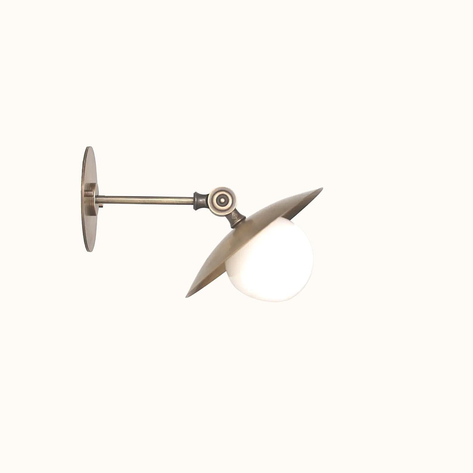 One-Light Adjustable Brass Saucer Wall Sconce with Opal Globe