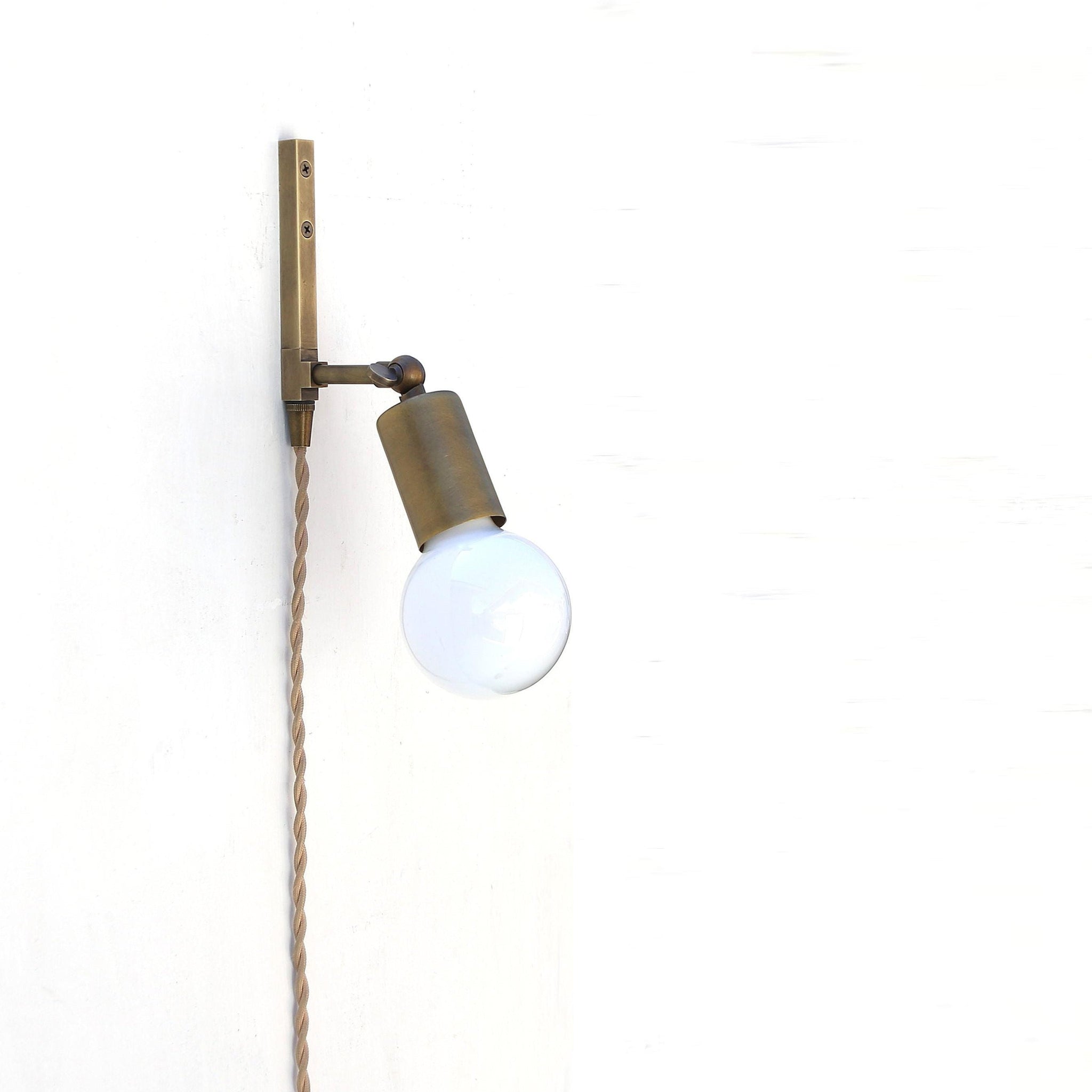 One-Light Adjustable Plug-In Wall Sconce with Exposed Bulb