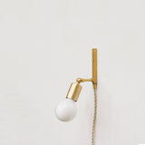 One-Light Adjustable Plug-In Wall Sconce with Exposed Bulb