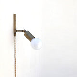 One-Light Adjustable Plug-In Wall Sconce with Exposed Bulb