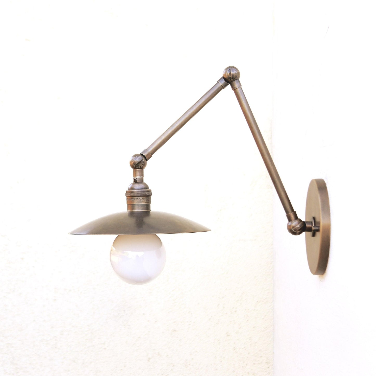 One-Light Adjustable Swing Arm Wall Sconce with Flat Disc Shade
