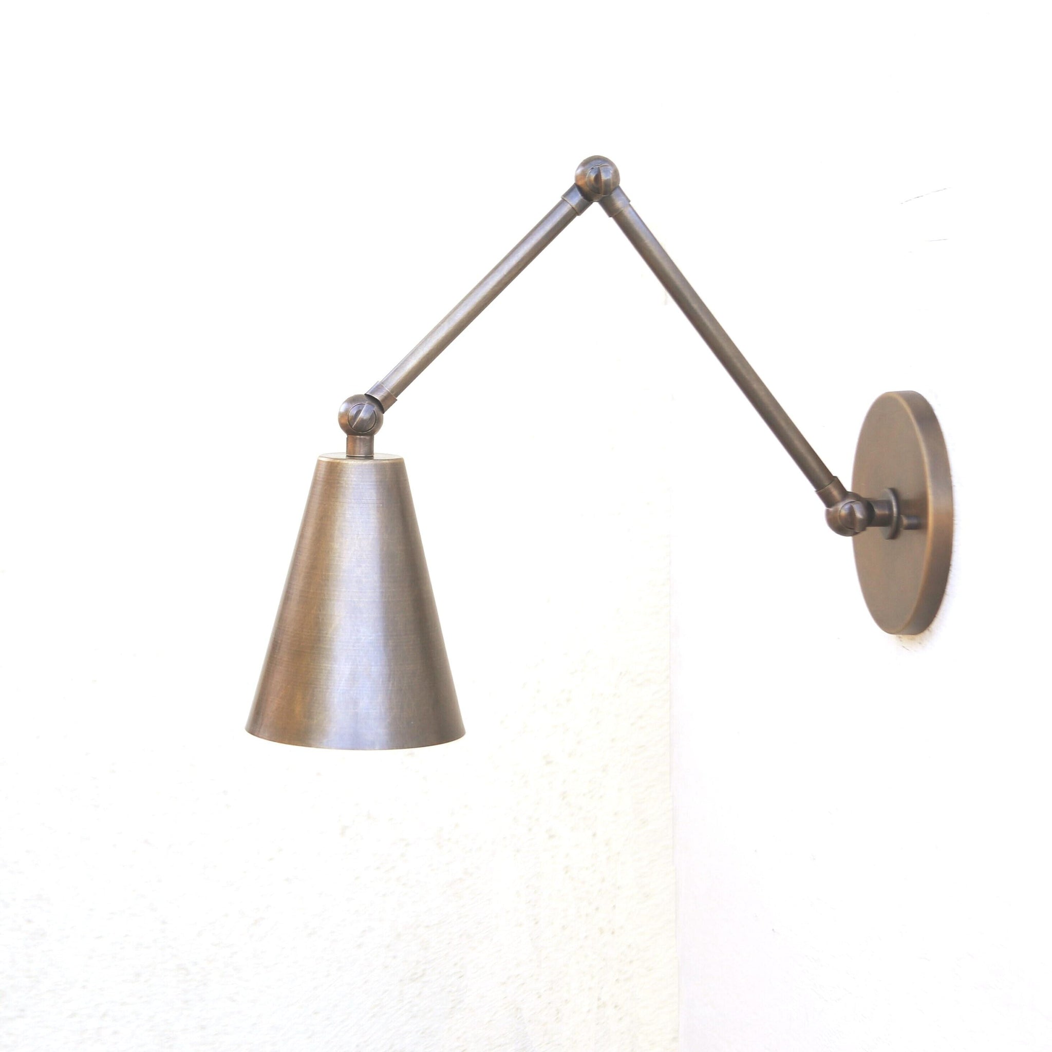 One-Light Adjustable Swing Arm Wall Sconce with Large Brass Cone