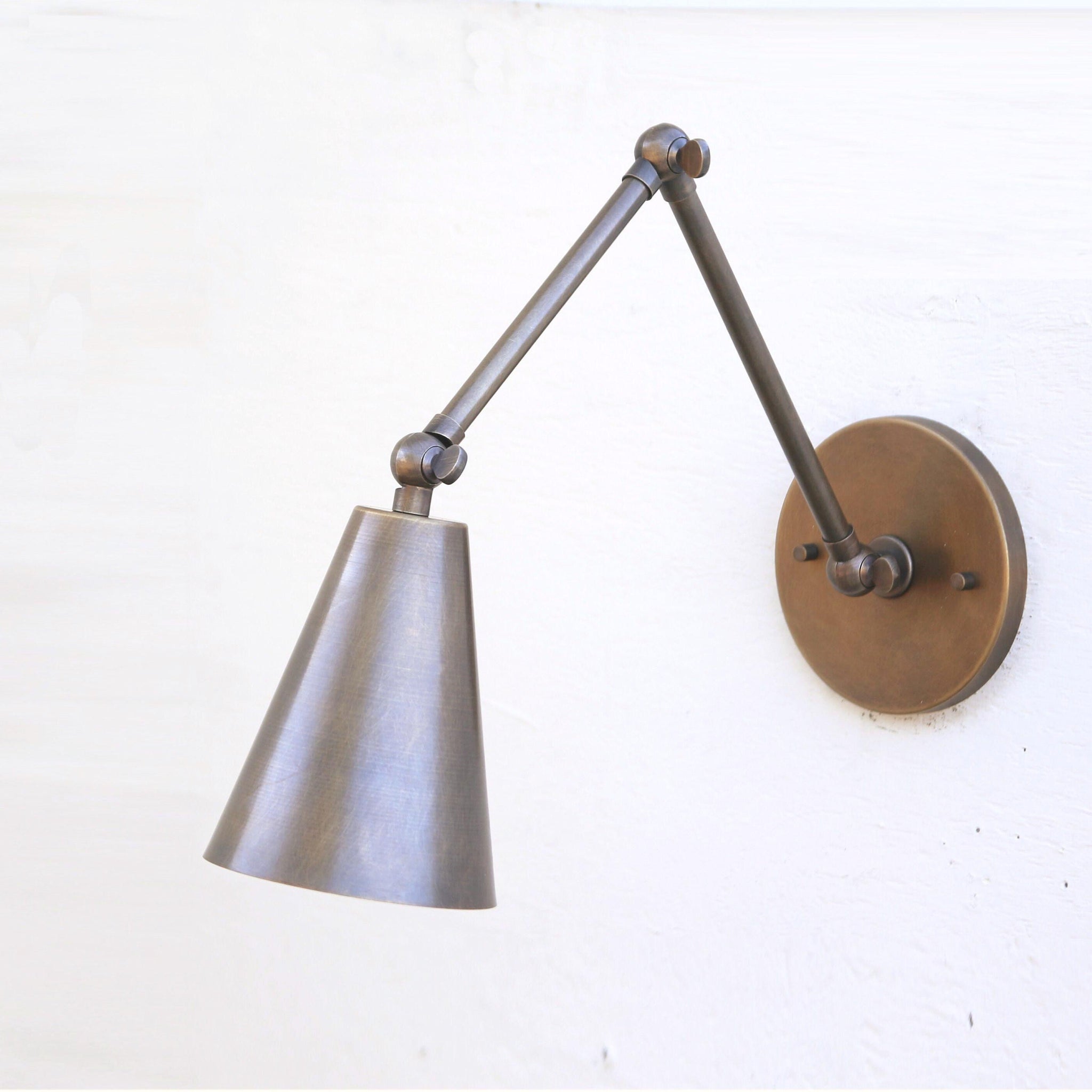 One-Light Adjustable Swing Arm Wall Sconce with Large Brass Cone